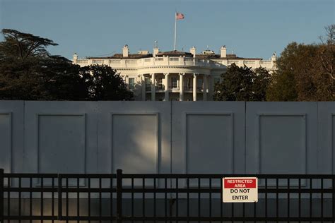 metal scaffolding being put up around the white house|Ring of Steel Installed Around White House As Police Brace.